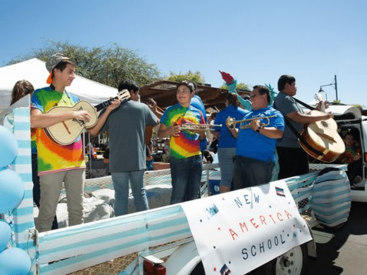 New America School rides a float playing mariachi music Saturday, September 17, 2016, during the Plaza de Las Cruces dedication parade at downtown Main Street.